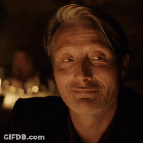 A Close Up Of A Man 'S Face With A Beard GIF