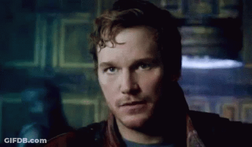 A Close Up Of A Man 'S Face With A Beard Looking At The Camera . GIF
