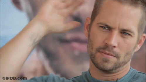 A Close Up Of A Man 'S Face With A Beard GIF