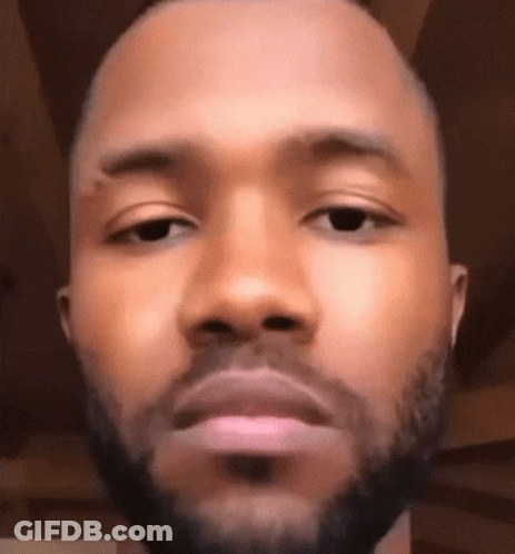 A Close Up Of A Man 'S Face With A Beard Making A Funny Face . GIF