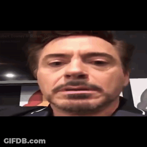 A Close Up Of A Man 'S Face With A Beard GIF