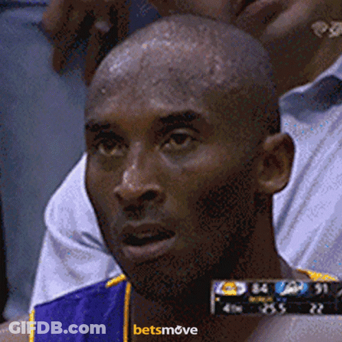 A Close Up Of A Man 'S Face With A Betsmove Logo Behind Him GIF