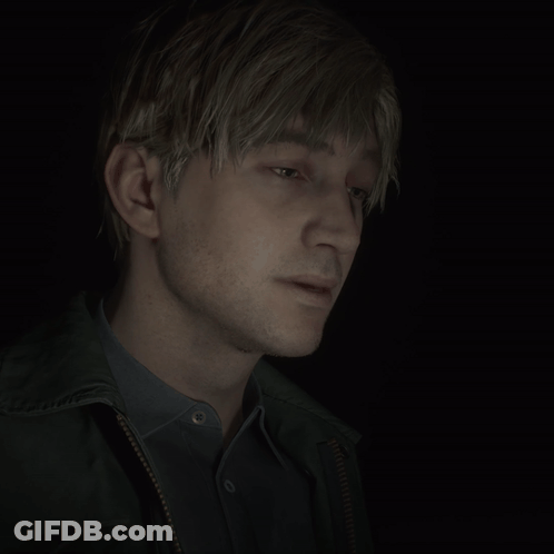 A Close Up Of A Man 'S Face With A Black Background GIF