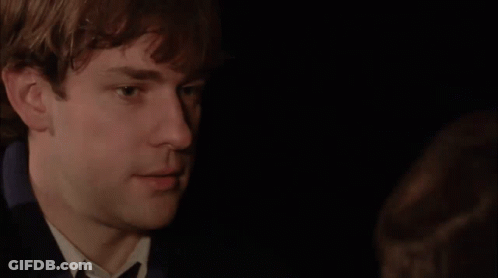 A Close Up Of A Man 'S Face With A Black Background GIF
