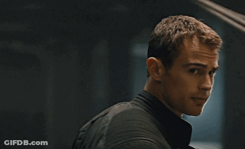 A Close Up Of A Man 'S Face With A Black Jacket On GIF
