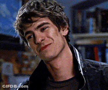 A Close Up Of A Man 'S Face With A Black Jacket On GIF