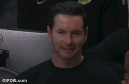 A Close Up Of A Man 'S Face With A Black Shirt On GIF