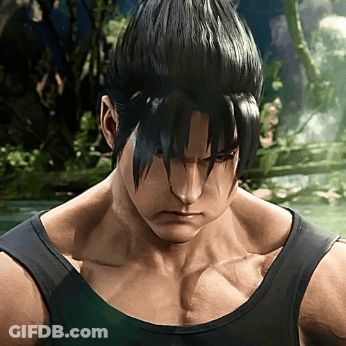 A Close Up Of A Man 'S Face With A Black Tank Top On GIF
