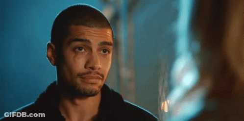 A Close Up Of A Man 'S Face With A Bloody Eye GIF