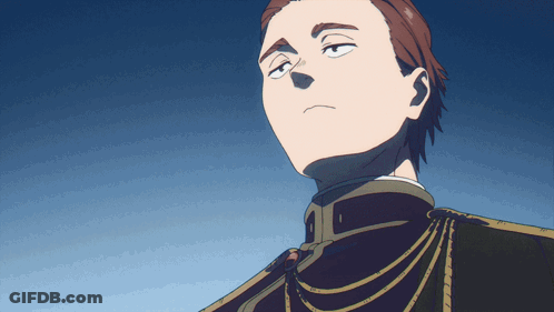 A Close Up Of A Man 'S Face With A Blue Background GIF