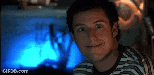 A Close Up Of A Man 'S Face With A Blue Background GIF