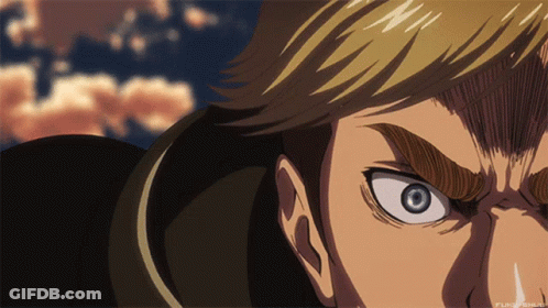 A Close Up Of A Man 'S Face With A Blue Eye And A Cloudy Sky In The Background GIF