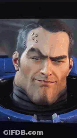 A Close Up Of A Man 'S Face With A Blue Helmet On GIF