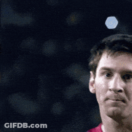 A Close Up Of A Man 'S Face With A Blue Hexagon In The Background GIF