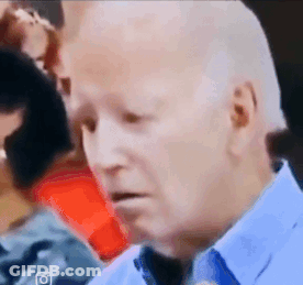 Close Up Of Man's Face In Blue Shirt And Tie GIF