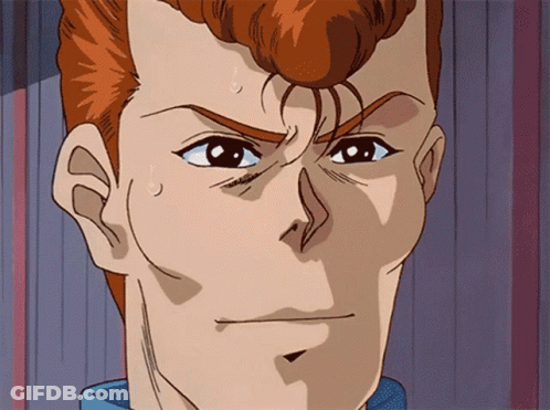 A Close Up Of A Man 'S Face With A Blue Shirt On GIF
