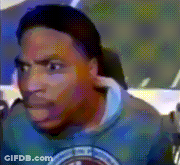 A Close Up Of A Man 'S Face With A Blue Shirt That Says ' Chicago ' On It GIF