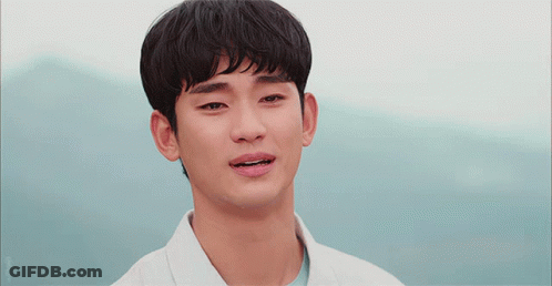 A Close Up Of A Man 'S Face With A Blue Sky Behind Him GIF