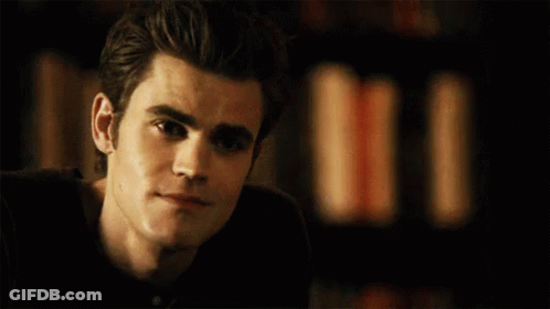 A Close Up Of A Man 'S Face With A Blurred Background GIF
