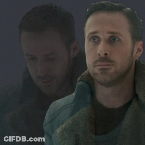 A Close Up Of A Man 'S Face With A Blurred Background GIF