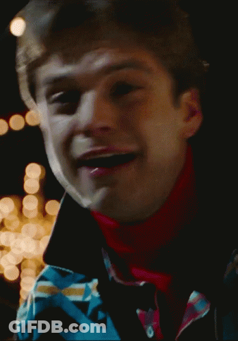 A Close Up Of A Man 'S Face With A Blurred Background GIF