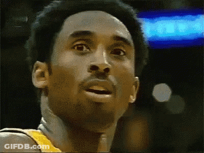 A Close Up Of A Man 'S Face With A Blurred Background GIF