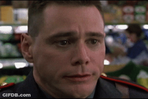 A Close Up Of A Man 'S Face With A Blurry Background GIF
