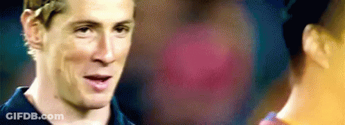 A Close Up Of A Man 'S Face With A Blurry Background . GIF