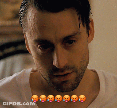 A Close Up Of A Man 'S Face With A Bunch Of Smiley Faces On His Neck GIF