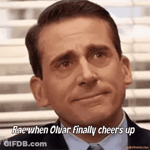 A Close Up Of A Man 'S Face With A Caption That Says Rae When Olvar Finally Cheers Up GIF