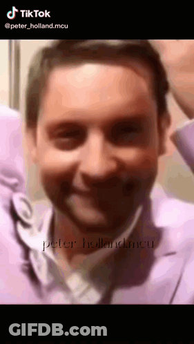 A Close Up Of A Man 'S Face With A Caption That Says Tik Tok GIF