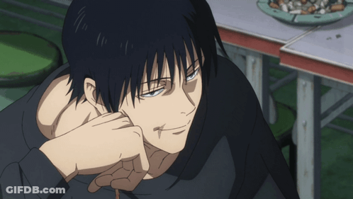 A Close Up Of A Man 'S Face With A Cigarette In His Mouth GIF