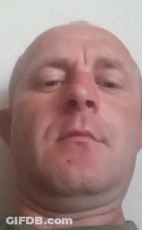 A Close Up Of A Man 'S Face With A Cross On His Forehead GIF