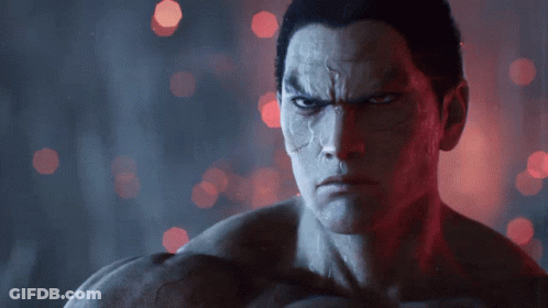 A Close Up Of A Man 'S Face With A Dark Background GIF