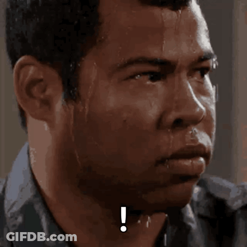 A Close Up Of A Man 'S Face With A Exclamation Point On His Forehead GIF
