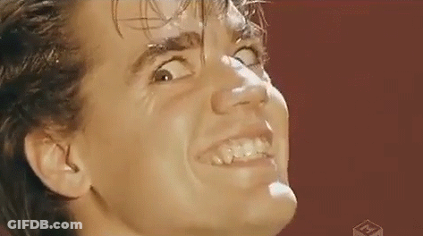 A Close Up Of A Man 'S Face With A Funny Face . GIF