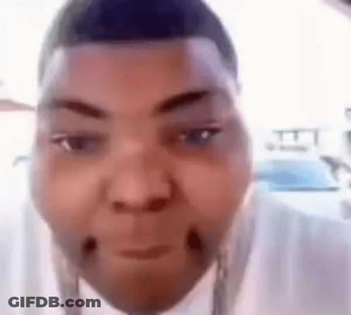 A Close Up Of A Man 'S Face With A Funny Face . GIF