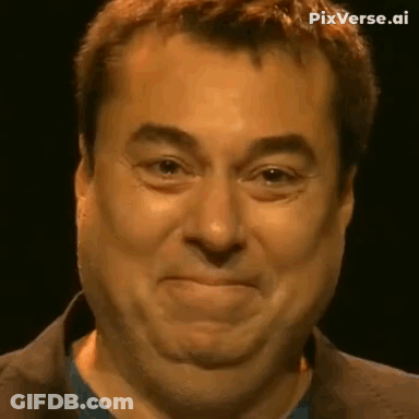 A Close Up Of A Man 'S Face With A Funny Face . GIF