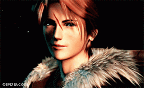 A Close Up Of A Man 'S Face With A Fur Coat Around His Neck GIF