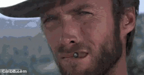 A Close Up Of A Man 'S Face With A Gifbin.com Watermark At The Bottom GIF