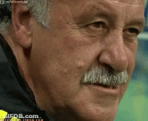 A Close Up Of A Man 'S Face With A Gmail.com Email Address GIF