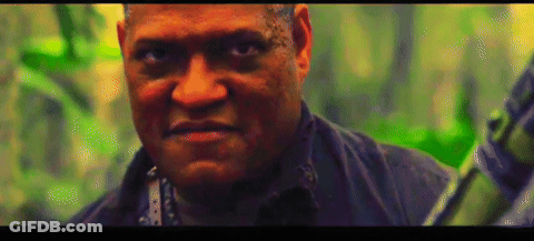 A Close Up Of A Man 'S Face With A Green Background Behind Him GIF