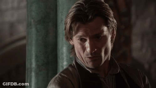A Close Up Of A Man 'S Face With A Green Pillar In The Background GIF