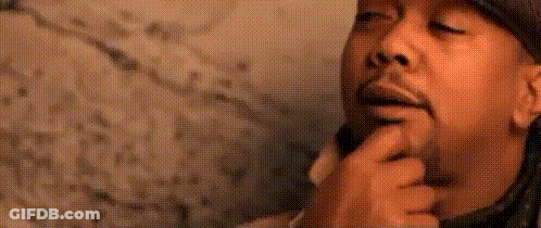 A Close Up Of A Man 'S Face With A Hat On GIF
