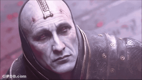 A Close Up Of A Man 'S Face With A Helmet On GIF