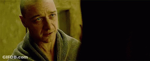 A Close Up Of A Man 'S Face With A Hole In His Head . GIF
