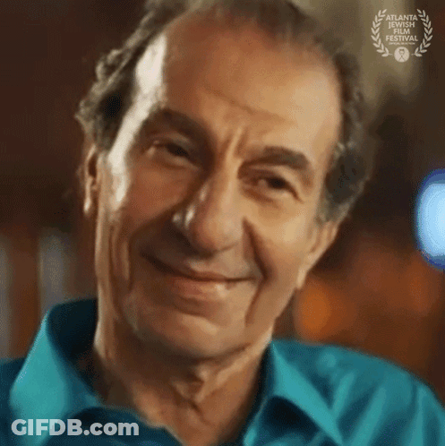 Man's Face With Laurel Wreath GIF