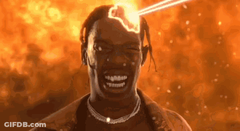 A Close Up Of A Man 'S Face With A Light Coming From His Head . GIF