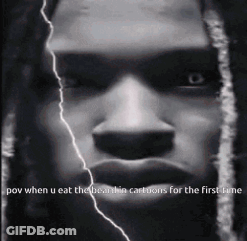 A Close Up Of A Man 'S Face With A Lightning Bolt Behind Him GIF