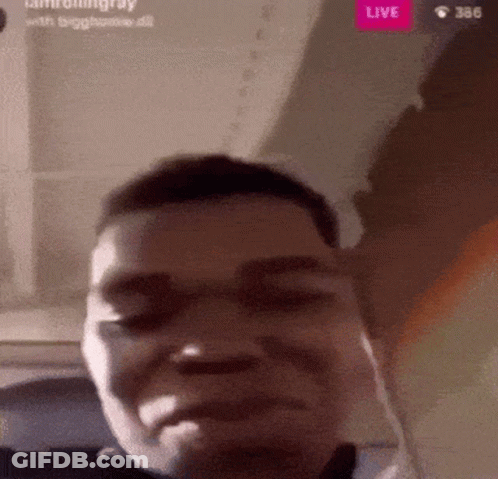 Close Up Of Man's Face With Live Button GIF